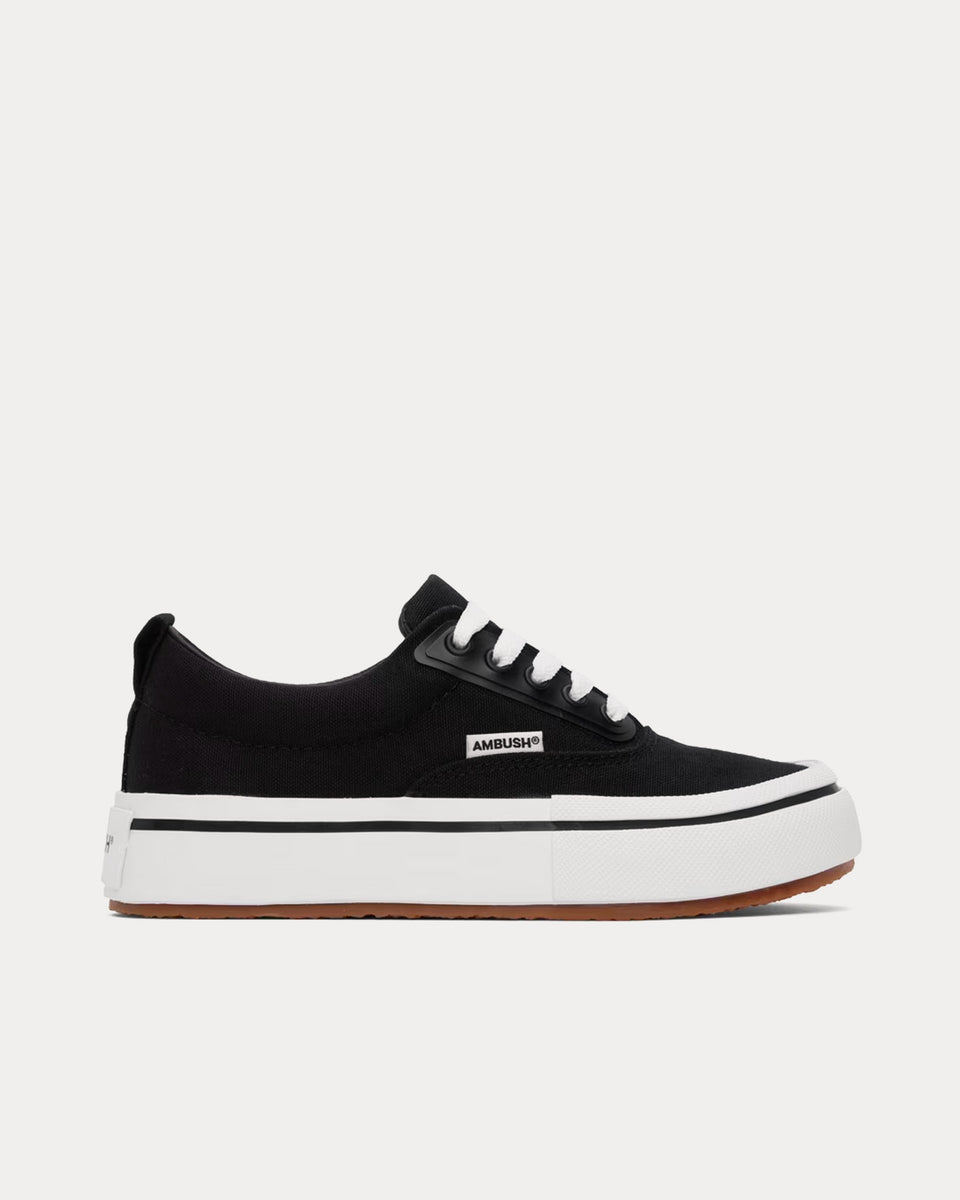 Vans vulcanized black on sale white