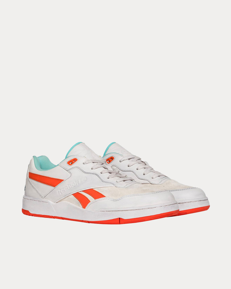 reebok orange trainers