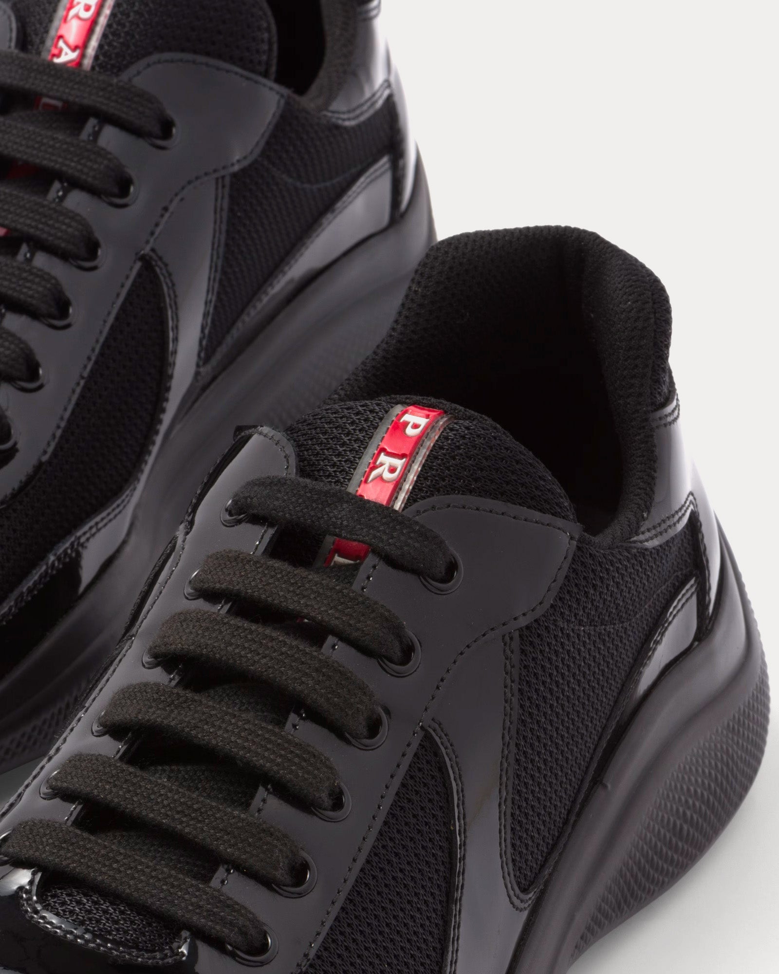 Prada americas cup trainers patent black best sale