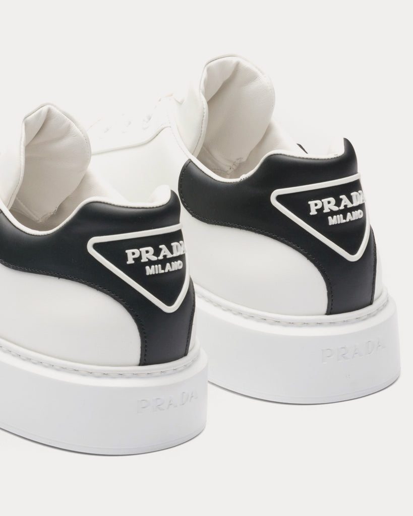 Black and white online prada trainers