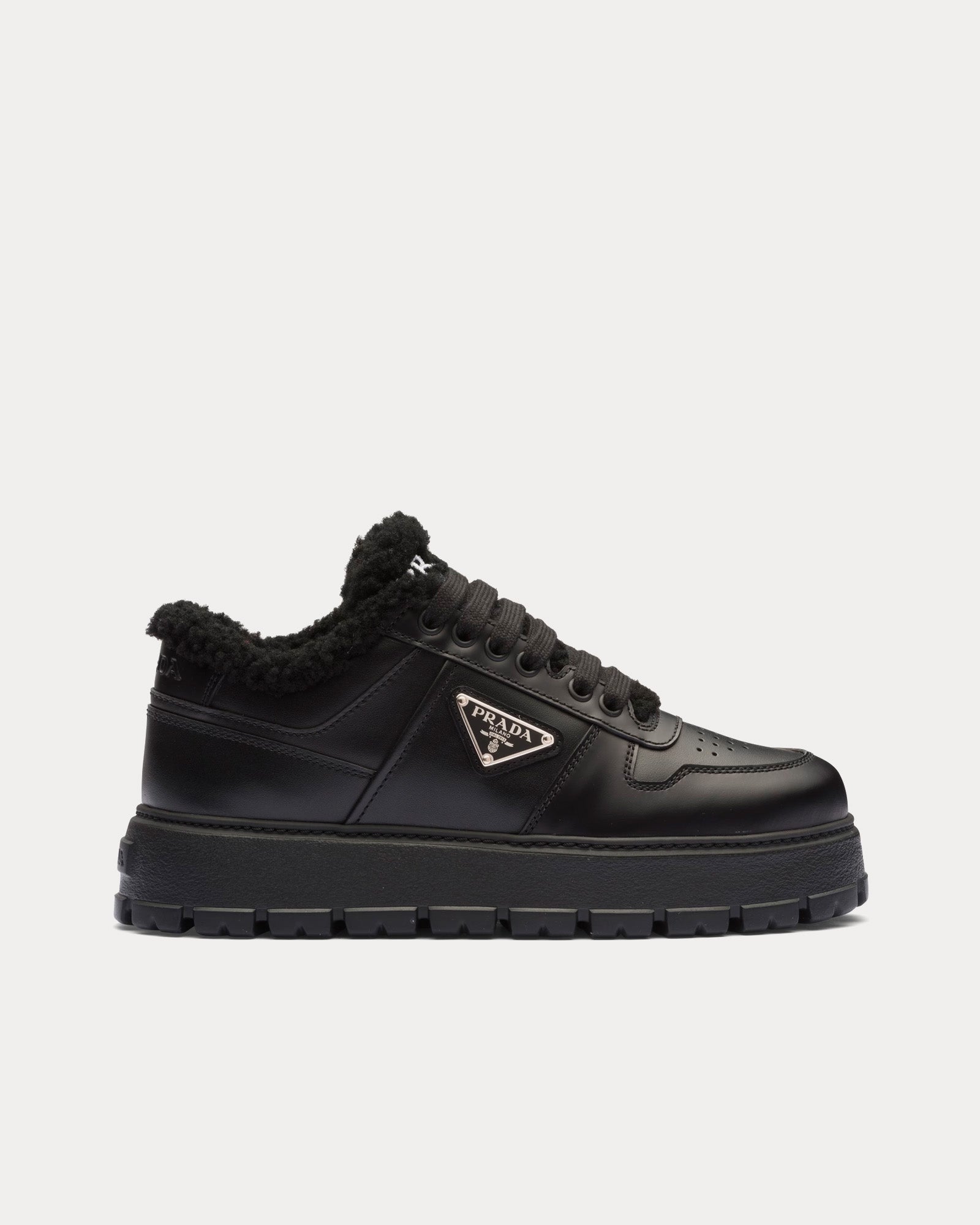 Logo leather low-top sneakers in black - Prada