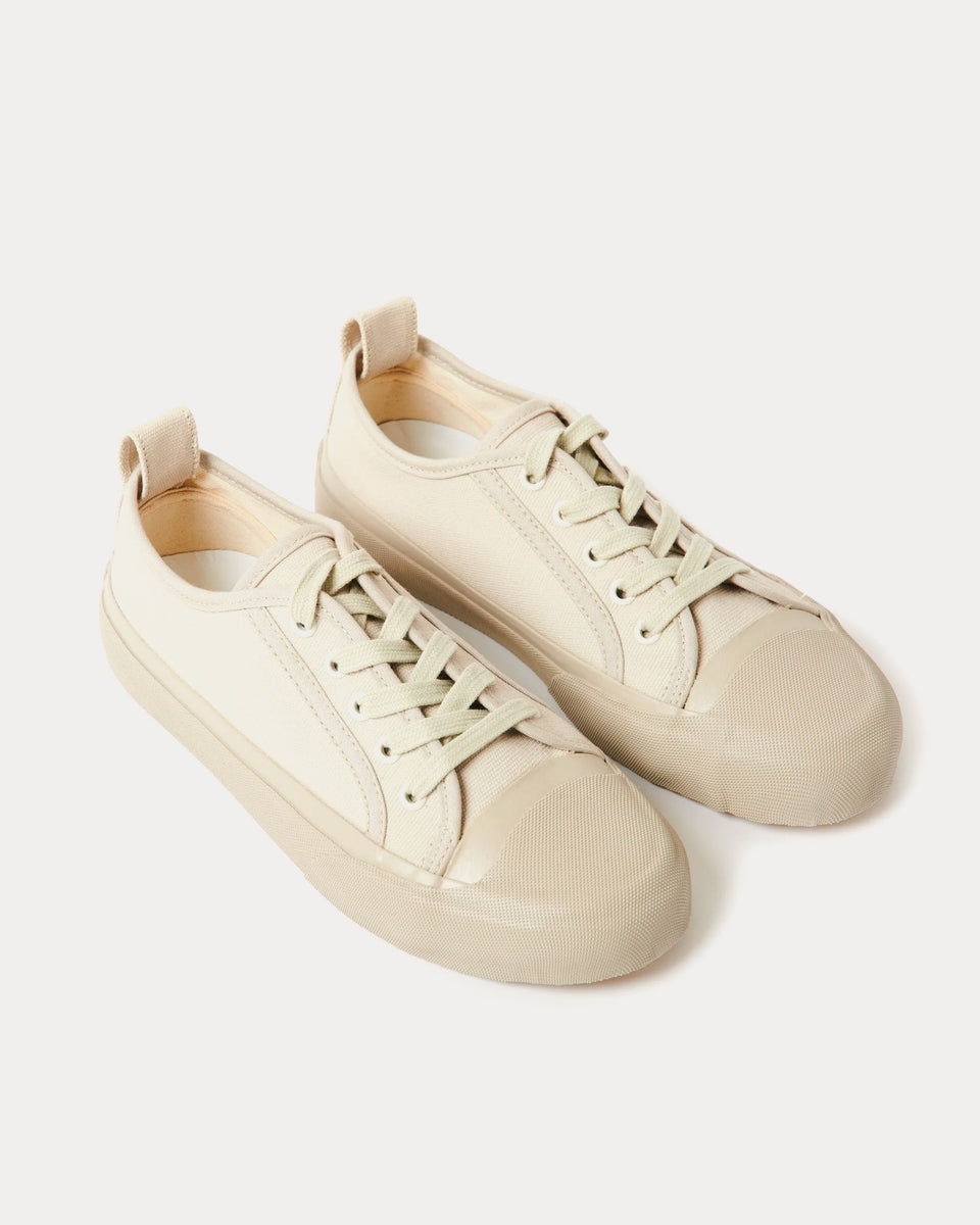 Studio Nicholson Byrd Canvas Dove Low Top Sneakers - Sneak in Peace