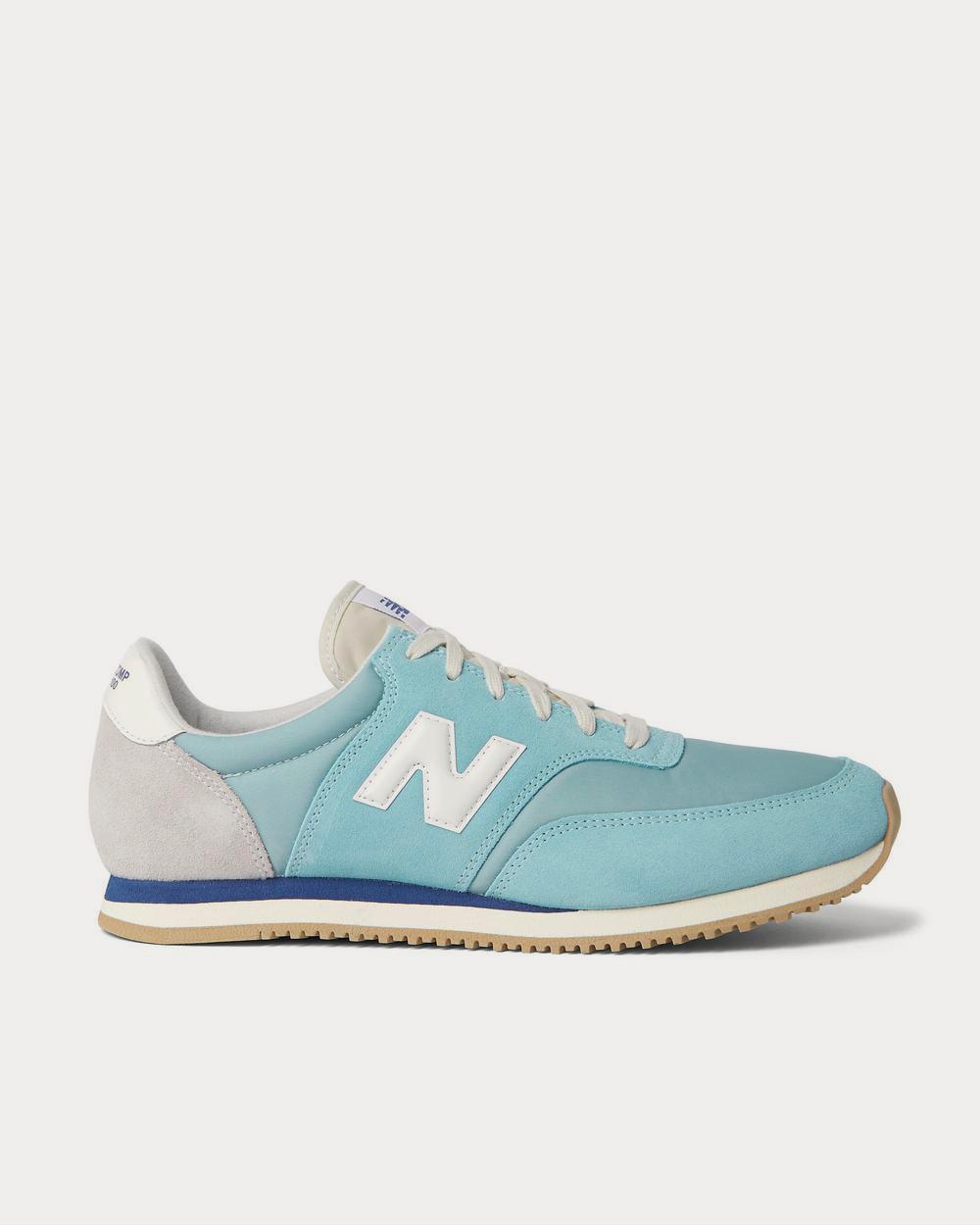 New Balance Comp 100 Leather and Suede-Trimmed Shell  Light blue low top sneakers - 1