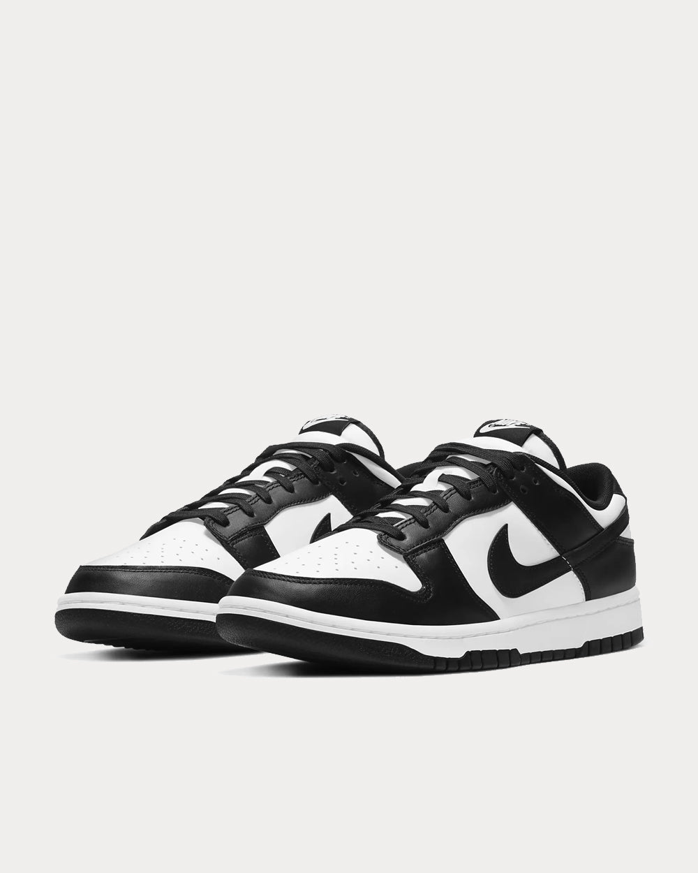 Nike Dunk Low Retro White / White / Black Low Top Sneakers - Sneak in Peace