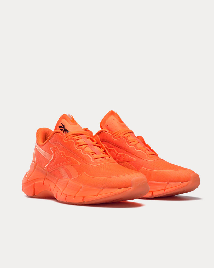 Reebok deals shoes orange