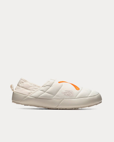 The North Face x KAWS Thermoball Traction Mule V Moonlight Ivory / Persian Orange Slip Ons