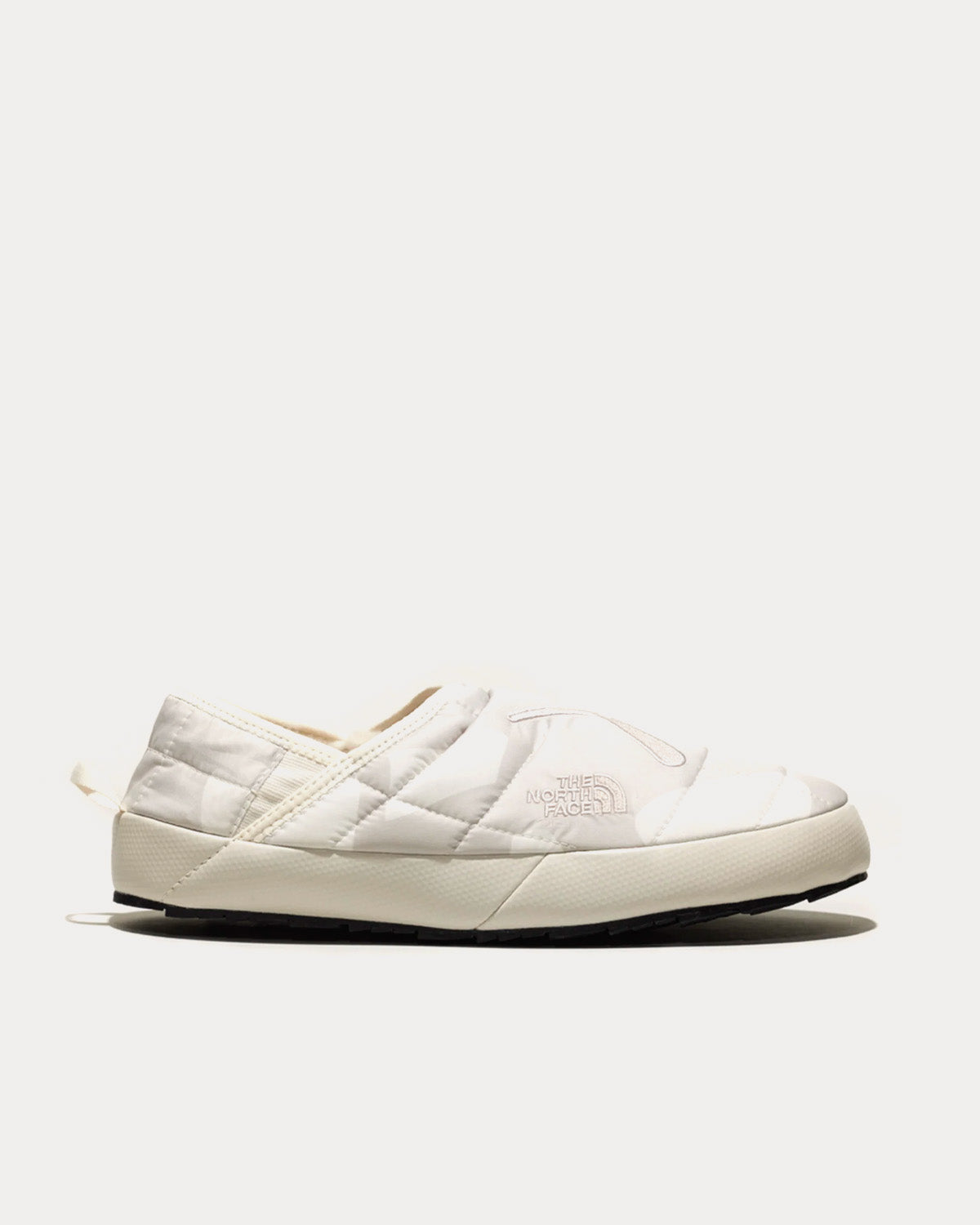 The North Face x KAWS Thermoball Traction Mule V Moonlight Ivory Slip Ons - 1