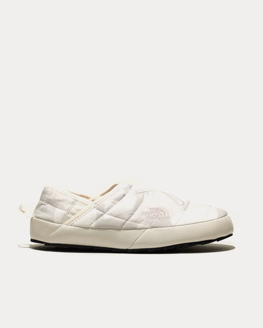 The North Face x KAWS Thermoball Traction Mule V Moonlight Ivory Slip Ons