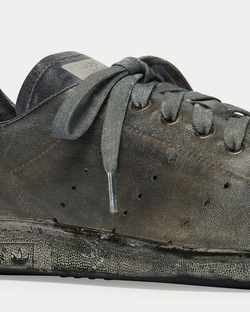 How much? 'Worn out' £645 Adidas Stan Smith trainers sell out at Balenciaga, Luxury goods sector