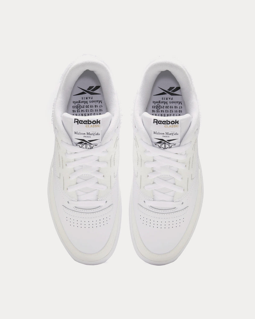 https://www.sneakinpeace.com/cdn/shop/products/reebok-x-MaisonMargielaClubCMemoryOfShoes-white-low-top-sneakers-2_1024x1024.jpg?v=1646998688